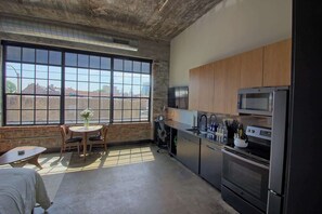 Fridge, microwave, oven, stovetop - Chic Ultramodern Studio Loft w/ Designer Features (St. Louis)