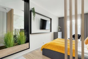 Fer et planche à repasser, lit parapluie, Wi-Fi, draps fournis