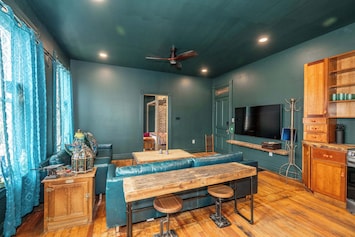 Curl up in the chic living room & stream your favorites on the smart TV