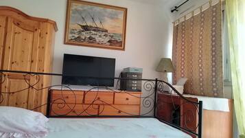 1 chambre, fer et planche Ă repasser, Wi-Fi, draps fournis