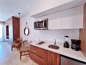 Fridge, microwave, coffee/tea maker, toaster