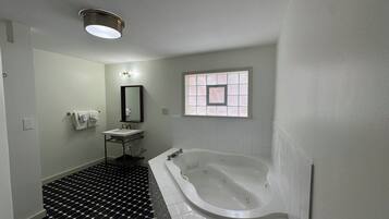 Jetted tub, towels, soap, toilet paper