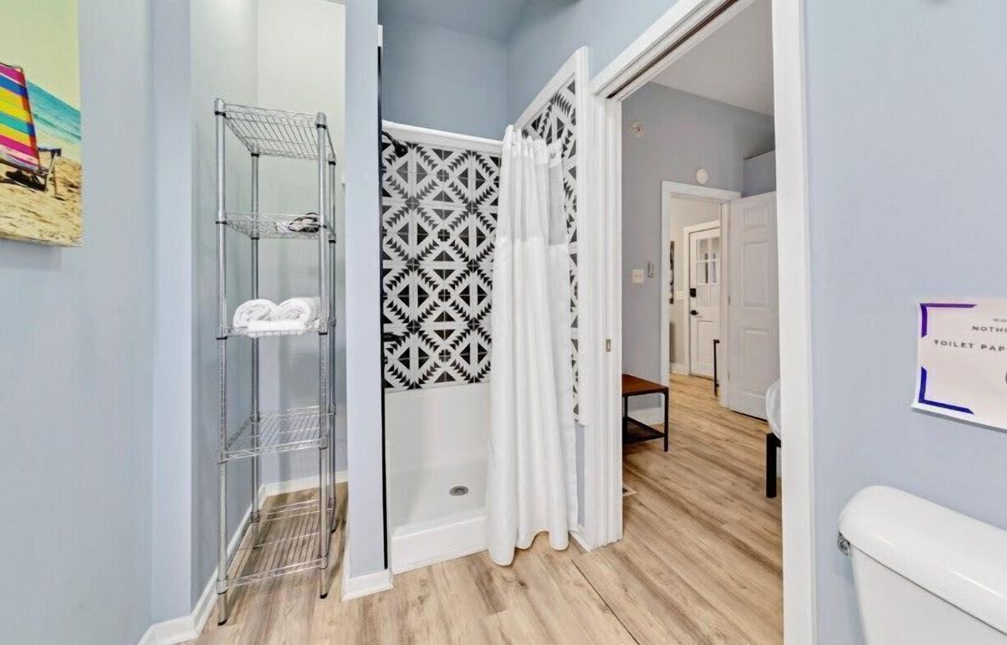 Shower, eco-friendly toiletries, hair dryer, towels