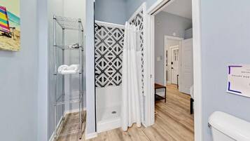 Shower, eco-friendly toiletries, hair dryer, towels