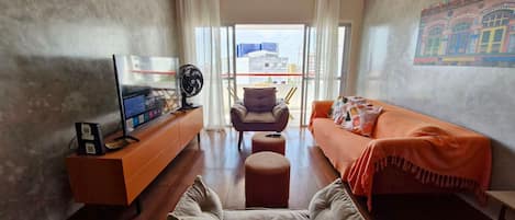 Comfort Apartment | Living area | 42-inch Smart TV with digital channels, Netflix, streaming services