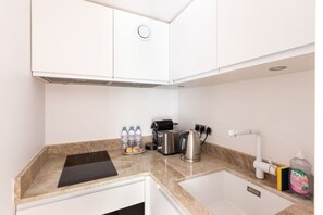 Fridge, oven, coffee/tea maker, toaster