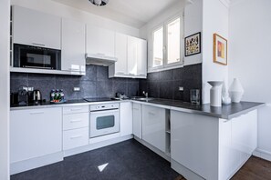 Fridge, dishwasher, cookware/dishes/utensils, dining tables