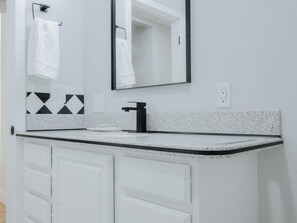 Shower, jetted tub, hair dryer, towels