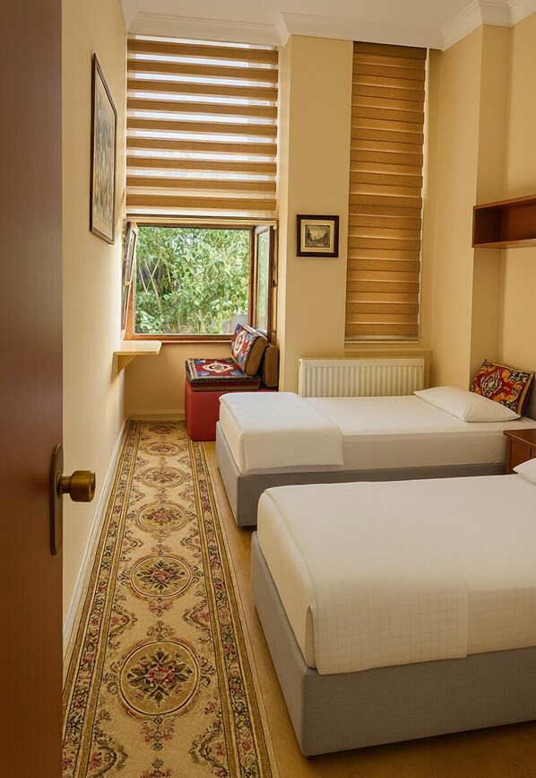 Habitación superior con 1 cama matrimonial o 2 individuales, vista a la ciudad