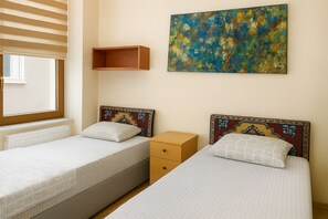 Quarto casal ou duplo superior, vista para a cidade
