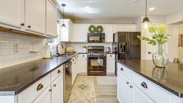 Dishwasher, coffee/tea maker, cookware/dishes/utensils