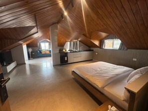 Deluxe Studio Suite, Balcony, Mountain View | In-room safe, free WiFi