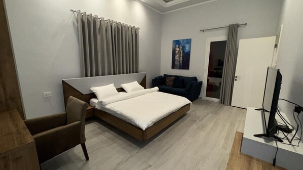 Deluxe Suite, Balcony, Mountain View | In-room safe, free WiFi