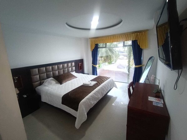 Deluxe Studio, Pool View | In-room safe, free WiFi