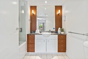 Shower, hair dryer, towels, soap