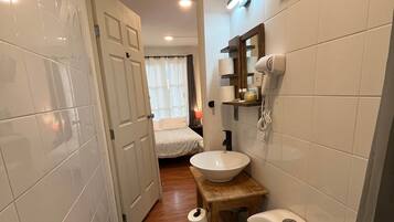 Hair dryer, towels, soap, shampoo