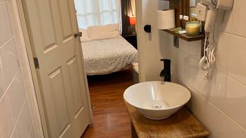 Hair dryer, towels, soap, shampoo