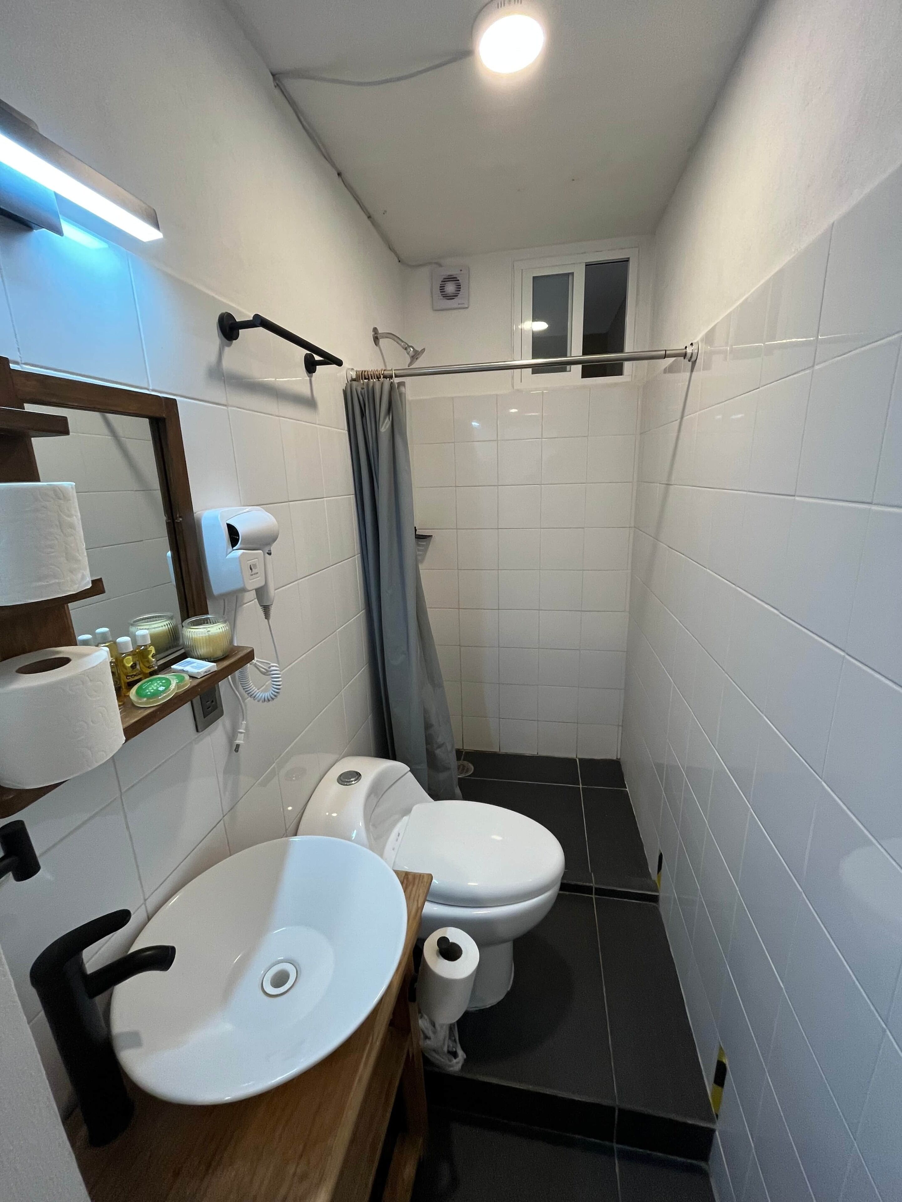 Hair dryer, towels, soap, shampoo