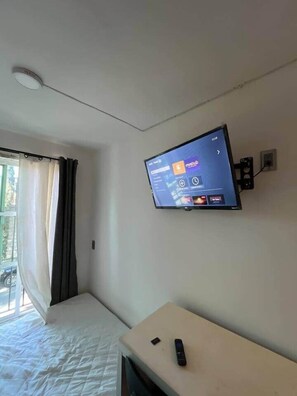 1 habitación, tabla de planchar con plancha, wifi y ropa de cama 