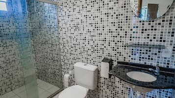Shower, towels, toilet paper