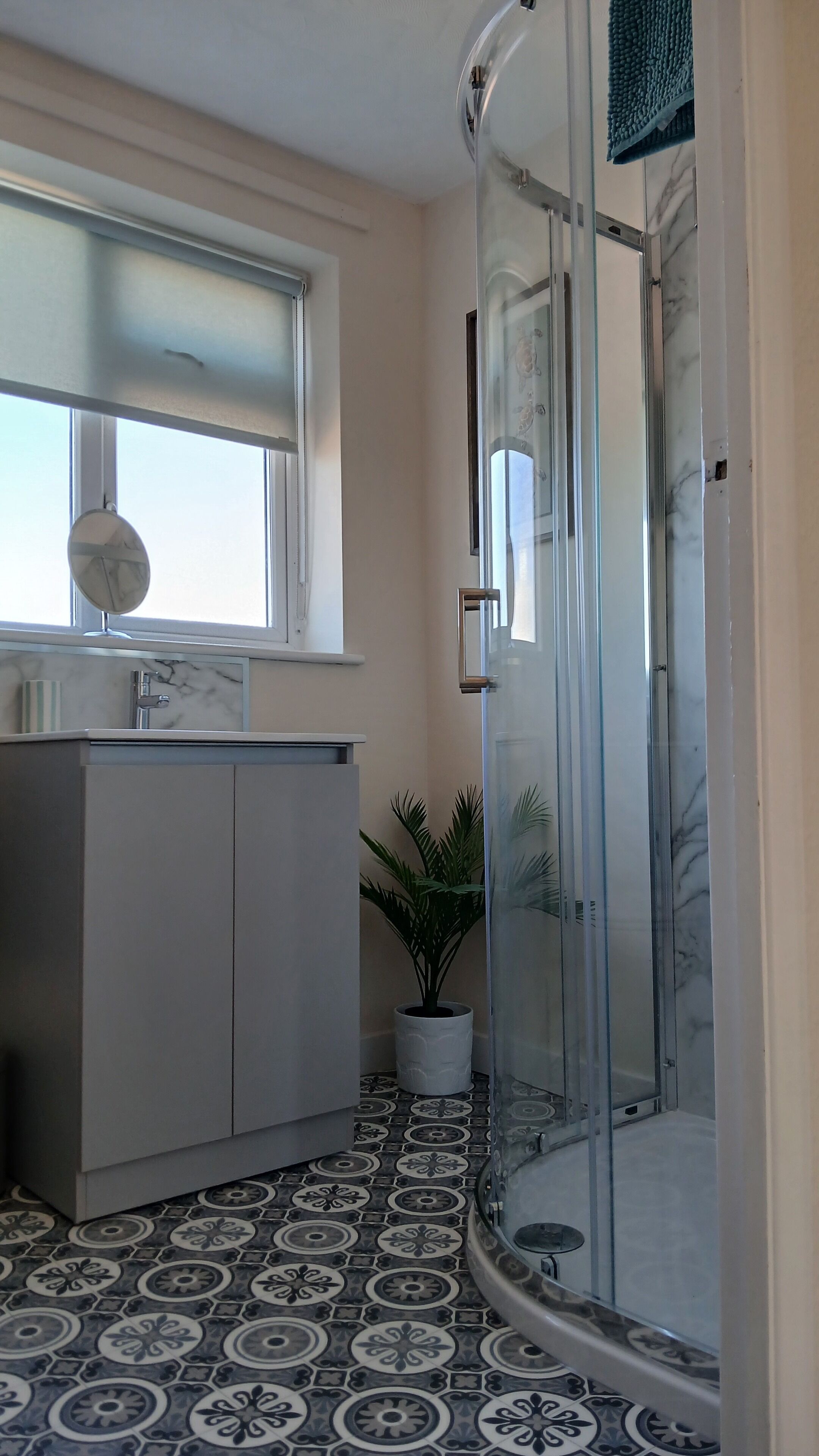 Shower, hair dryer, towels, toilet paper