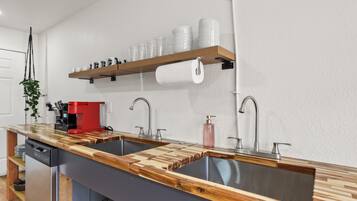 Fridge, microwave, stovetop, coffee/tea maker