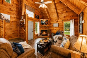 TV, fireplace - Cozy Smoky Mountain Cabin  - Hot Tub - Walk to Arts District - Prime Location (Gatlinburg)
