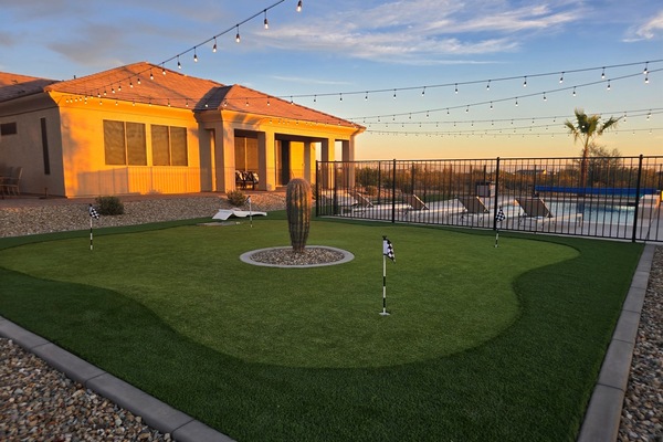 Private backyard oasis with heated pool, putting green & sunset views