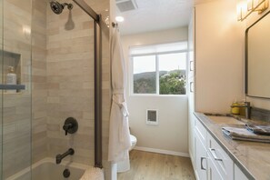 Hair dryer, towels, soap, toilet paper