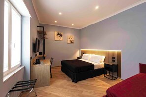 Family Double Room, City View | In-room safe, blackout drapes, soundproofing, iron/ironing board