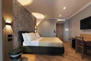 Deluxe Double Room, City View | In-room safe, blackout drapes, soundproofing, iron/ironing board