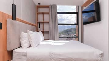 Egyptian cotton sheets, premium bedding, down duvets, in-room safe
