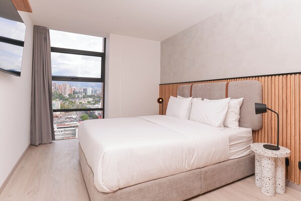 Egyptian cotton sheets, premium bedding, down comforters, in-room safe