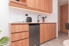 Mini-fridge, microwave, oven, stovetop