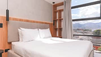 Egyptian cotton sheets, premium bedding, down duvets, in-room safe