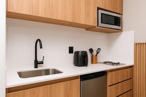 Mini-fridge, microwave, oven, stovetop