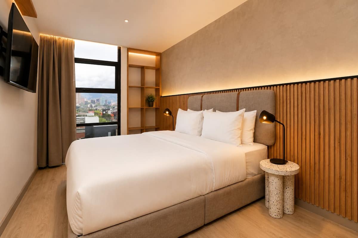 Egyptian cotton sheets, premium bedding, down comforters, in-room safe