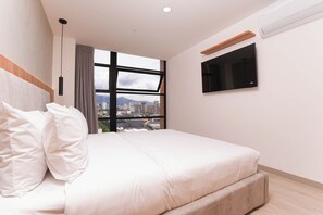 Egyptian cotton sheets, premium bedding, down duvets, in-room safe