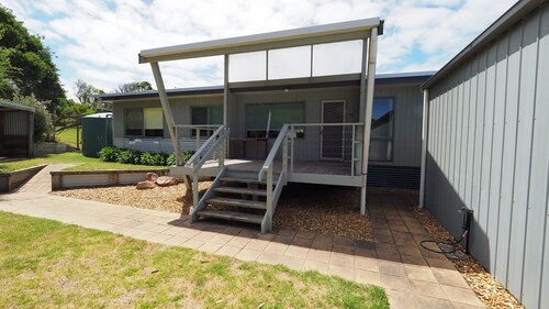 Listen to the waves at 27 Beach Parade Sandy Point