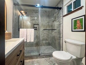 Shower, hair dryer, towels, soap