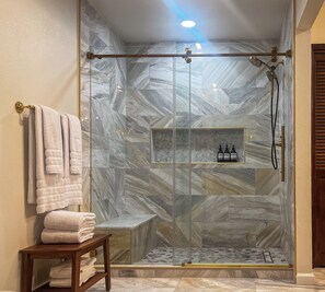 Shower, hair dryer, towels, soap