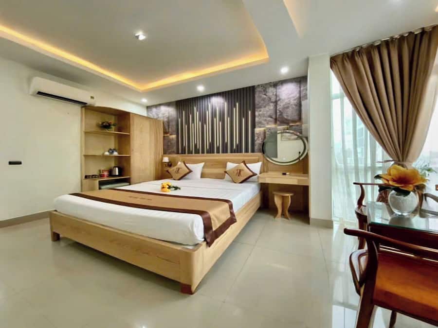 Quarto casal luxo, vista para a cidade | Escrivaninha, Wi-Fi de cortesia, roupa de cama