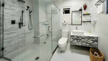Family Room | Bathroom | Shower, rainfall showerhead, designer toiletries, hair dryer