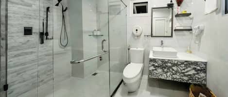 Family Room | Bathroom | Shower, rainfall showerhead, designer toiletries, hair dryer