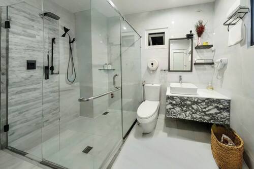 Family Room | Bathroom | Shower, rainfall showerhead, designer toiletries, hair dryer