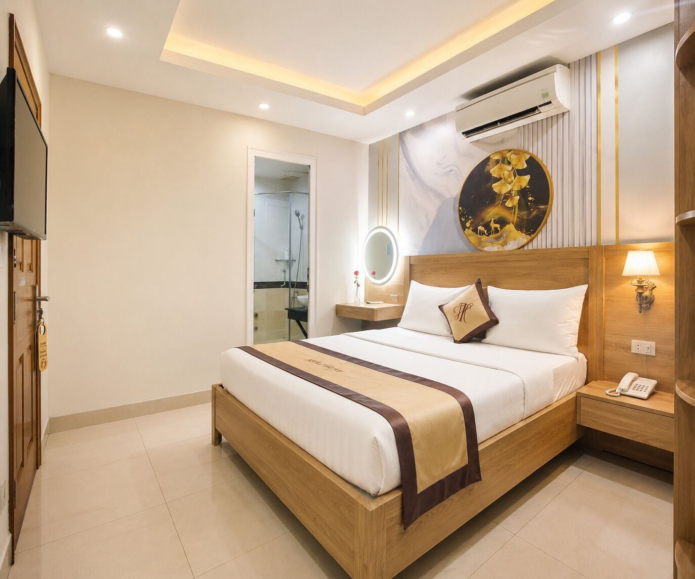 A hotel room with a wooden bed, a bedside table with a lamp, an air conditioning unit, and a mirror.
