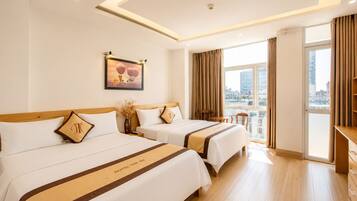 Family Room, City View | Desk, free WiFi, bed sheets