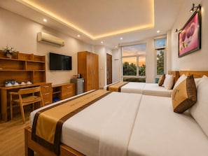Family Room, City View | Desk, free WiFi, bed sheets - Thu Ha Airport Hotel (Ho Chi Minh City)