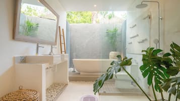 Shower, bathrobes, slippers, towels