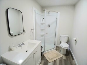 Bidet, towels, soap, toilet paper